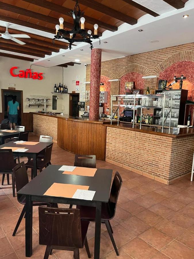 Hostal Restaurante Andra Rio Madera Buitenkant foto