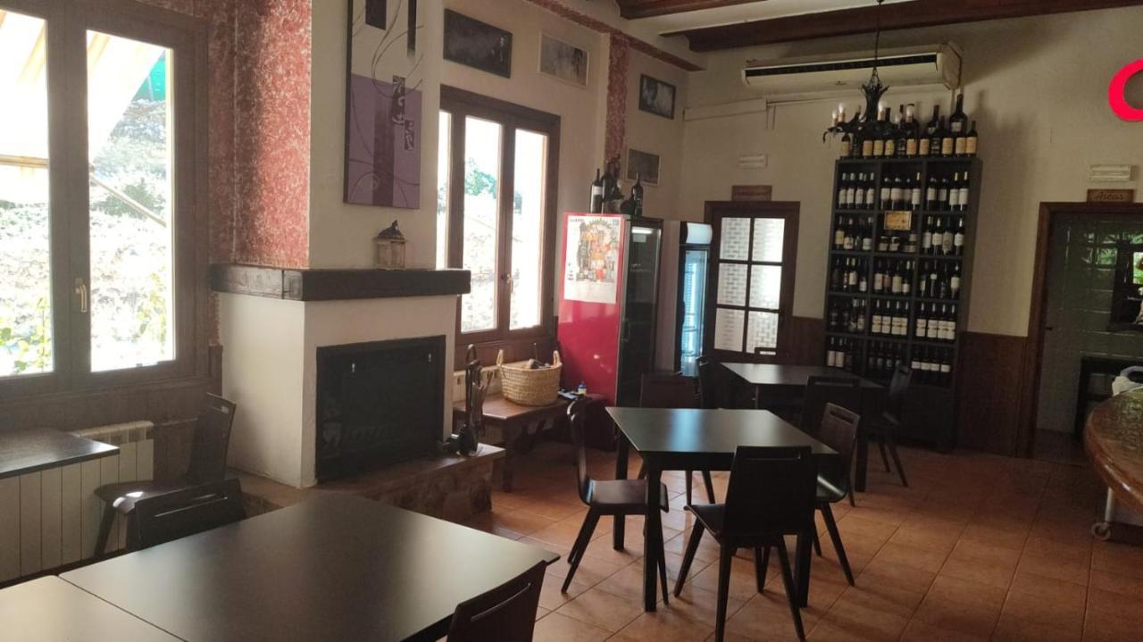 Hostal Restaurante Andra Rio Madera Buitenkant foto