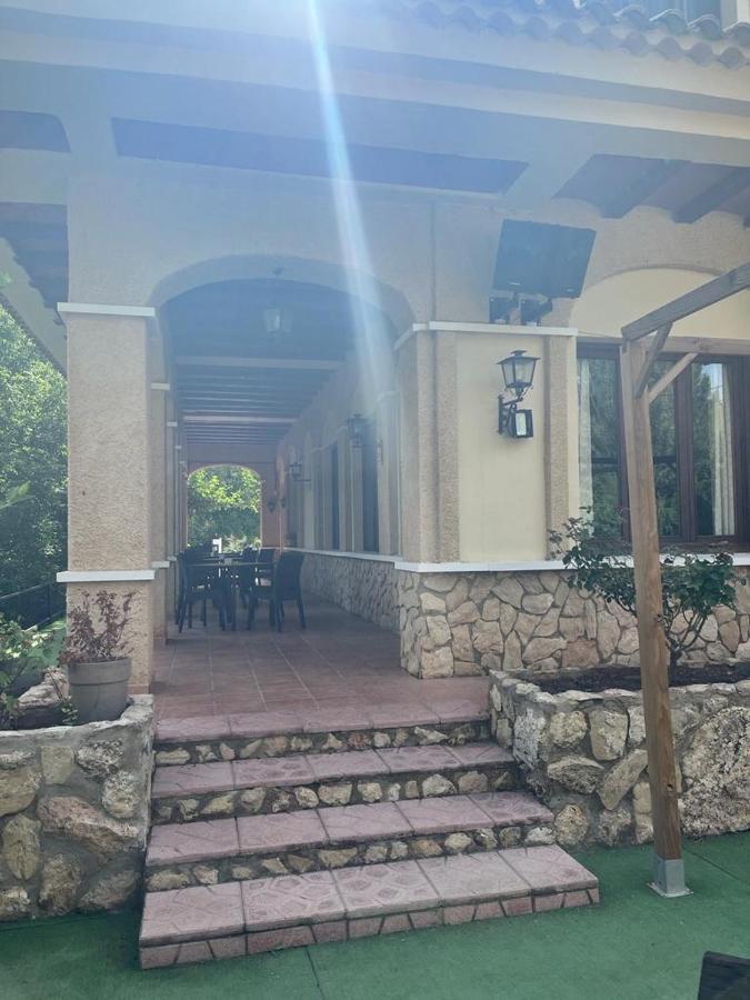 Hostal Restaurante Andra Rio Madera Buitenkant foto